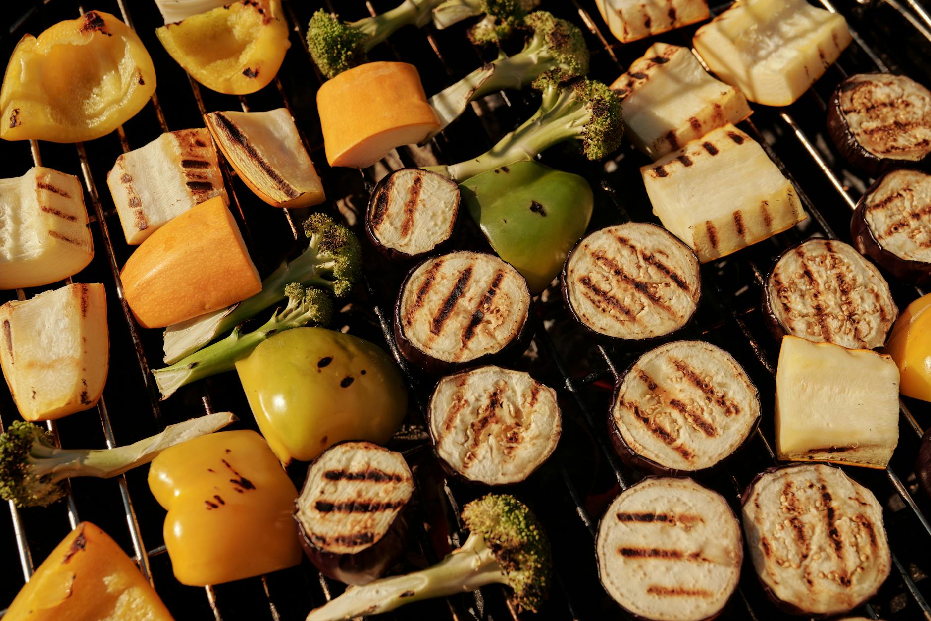 Assorted vegetables grilling on a barbecue grill — a popular healthy cooking method