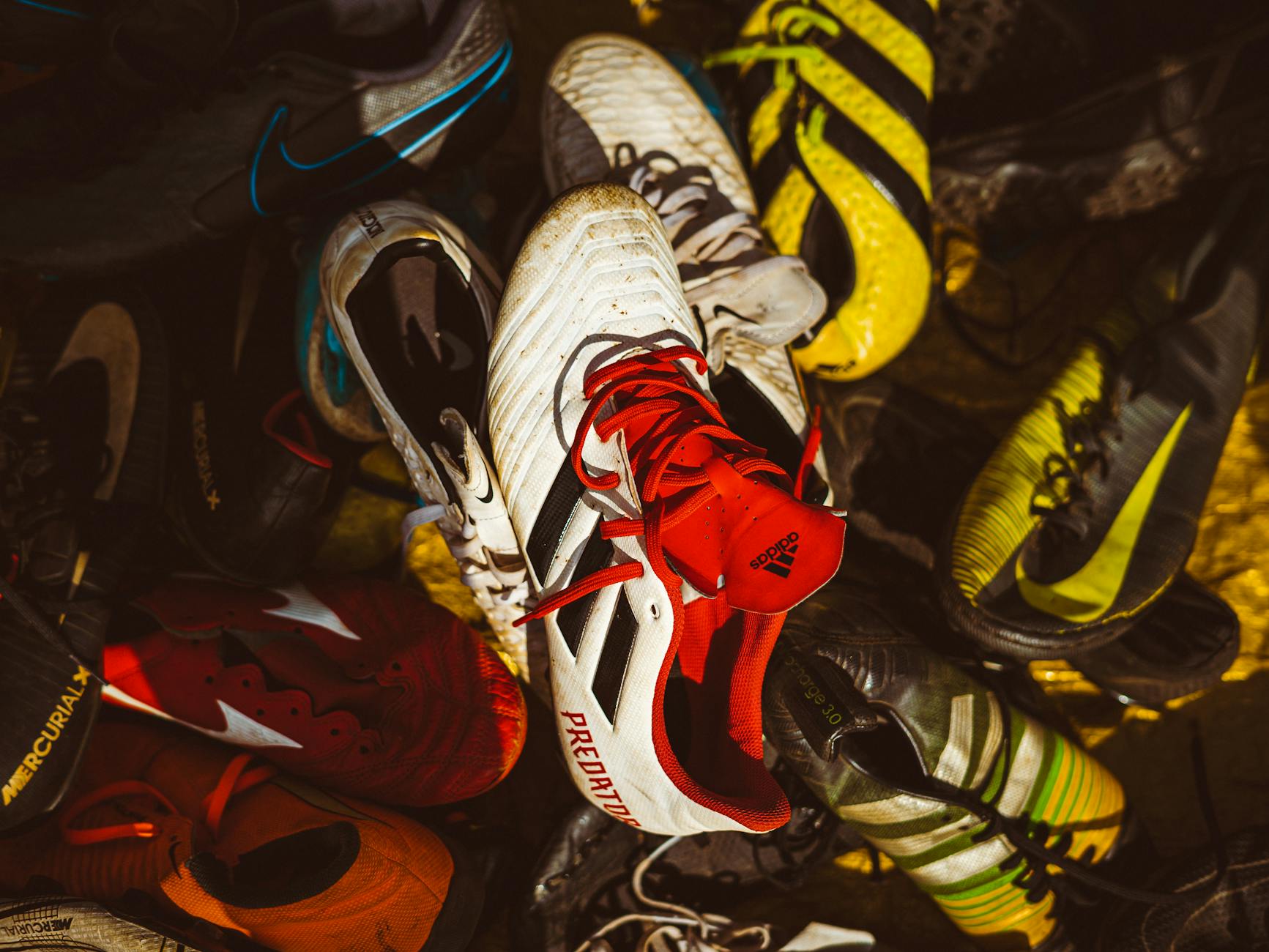 A colorful variety of athletic sneakers showing different designs and styles