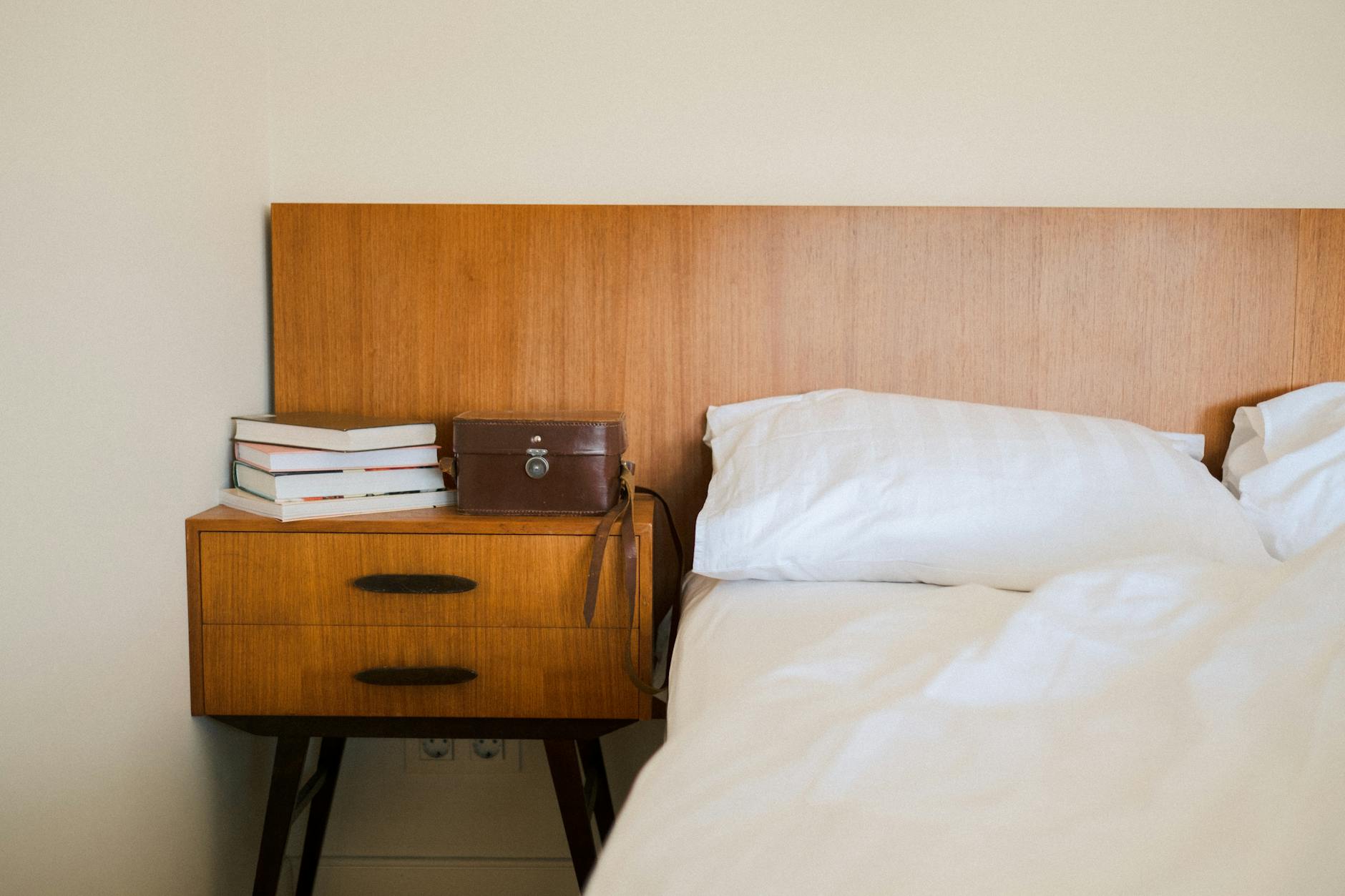 Organized Bedroom Nightstand Setup for Better Sleep Clean and organized bedroom nightstand with minimal decor for better sleep