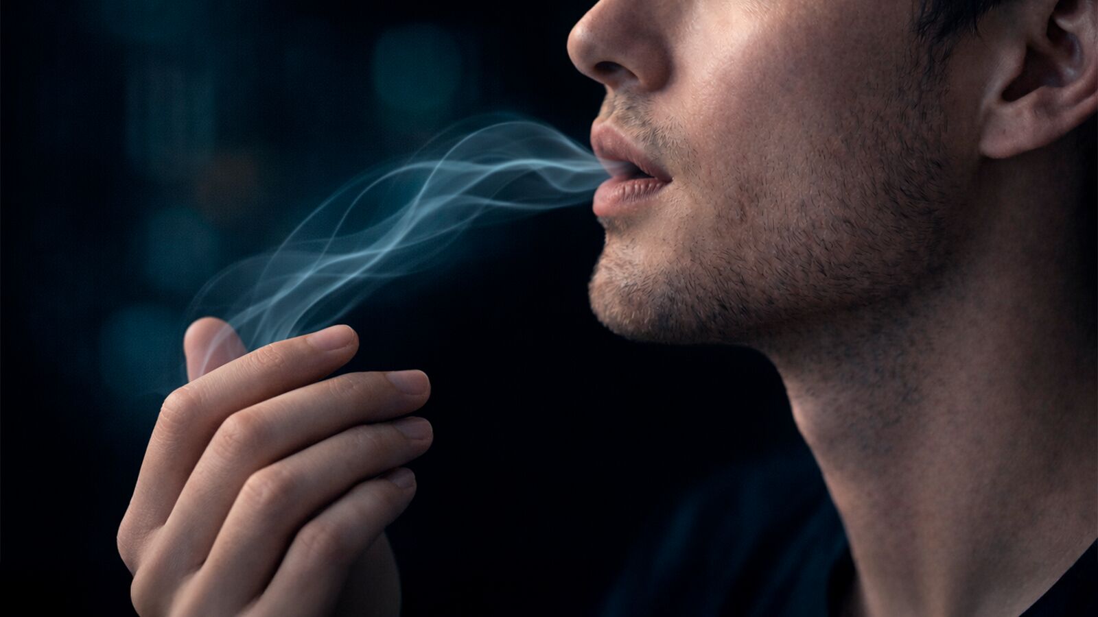 Man using CAPNOS Legura with satisfied expression in modern interior setting