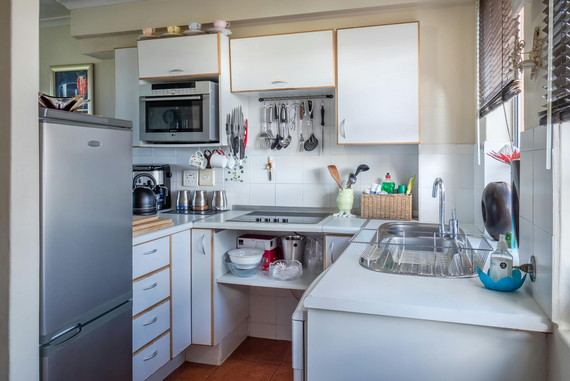 Clean, organized modern kitchen — the result of avoiding common cleaning mistakes