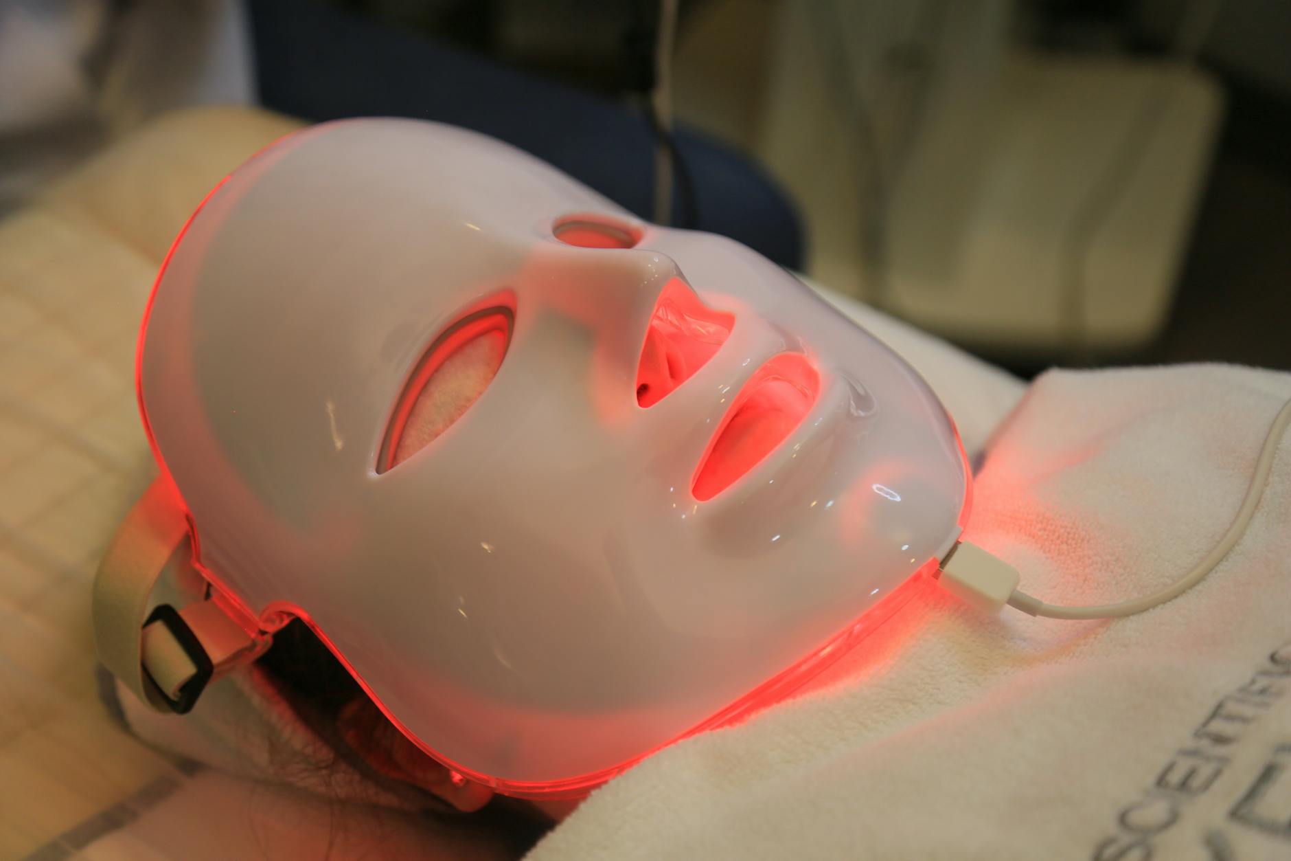 LED Light Mask Skincare Treatment 2026 Close-up of LED light mask used in modern red light therapy skin tightening skincare treatment