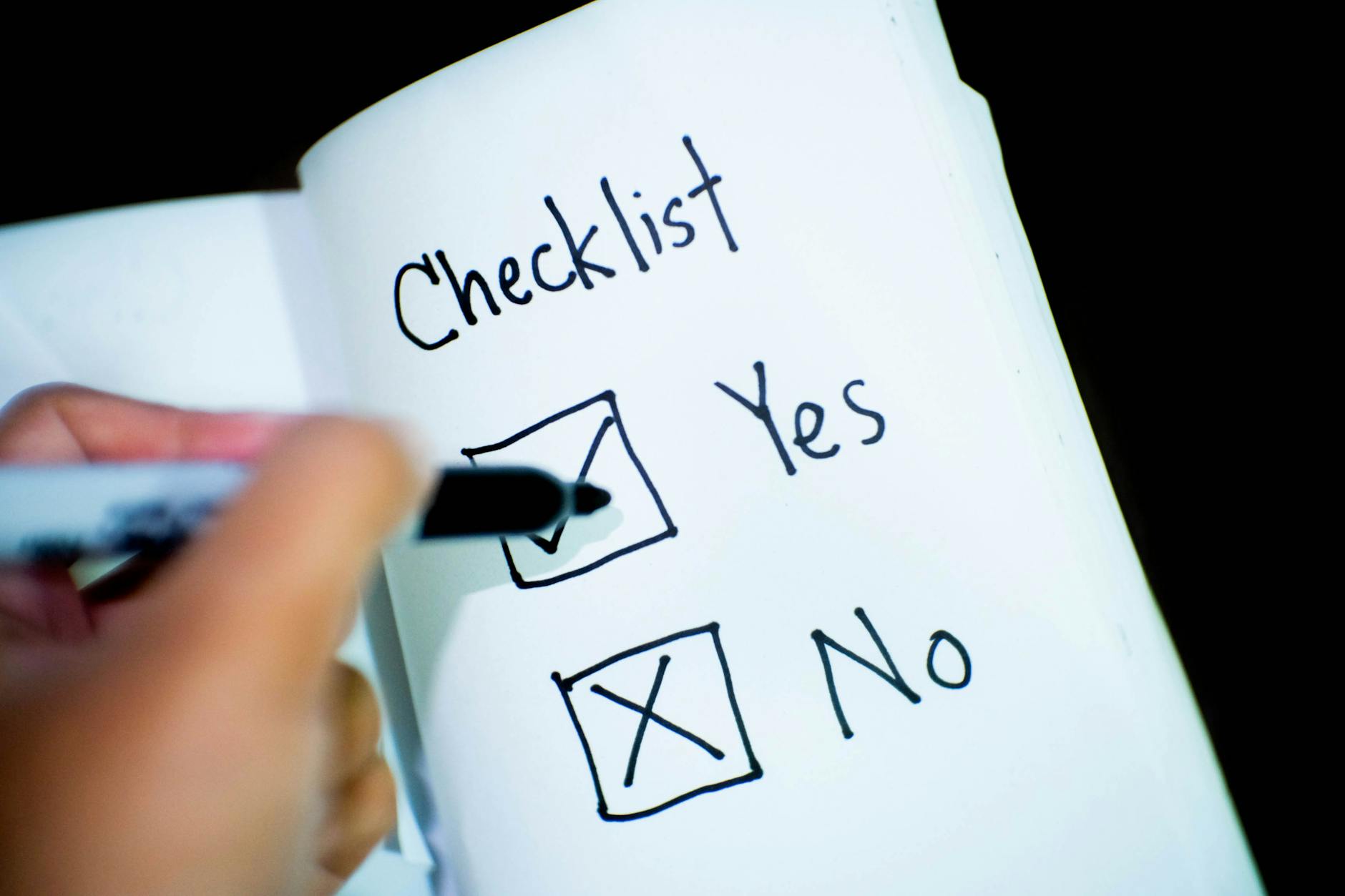 Emergency Preparedness Annual Review Checklist Emergency preparedness checklist in a notebook with completed tasks marked