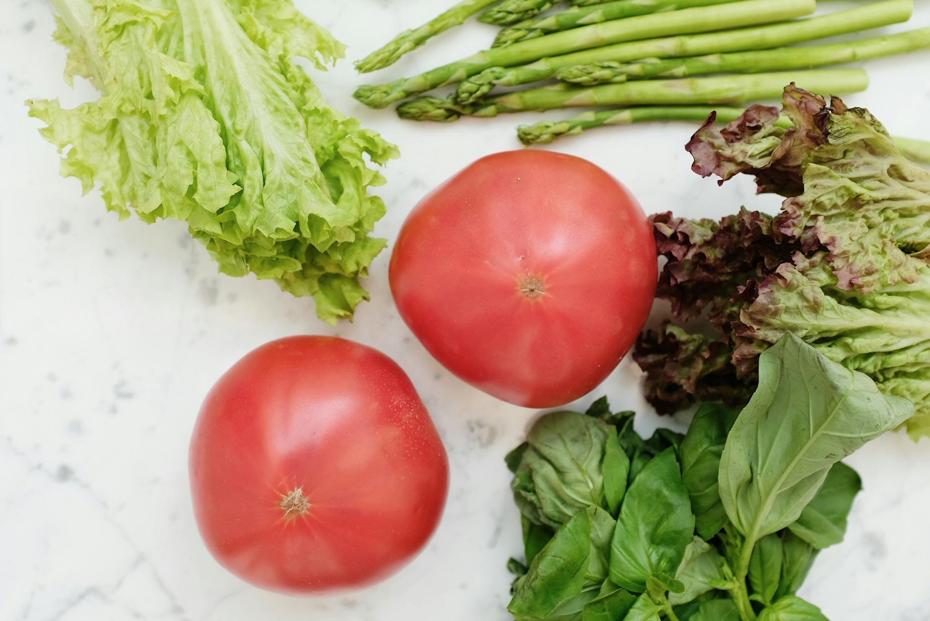 Fatty Liver Diet — Vegetables and Whole Foods for NAFLD Reversal Fresh vegetables and whole foods on a marble surface — the foundation of a fatty liver diet designed to reverse NAFLD