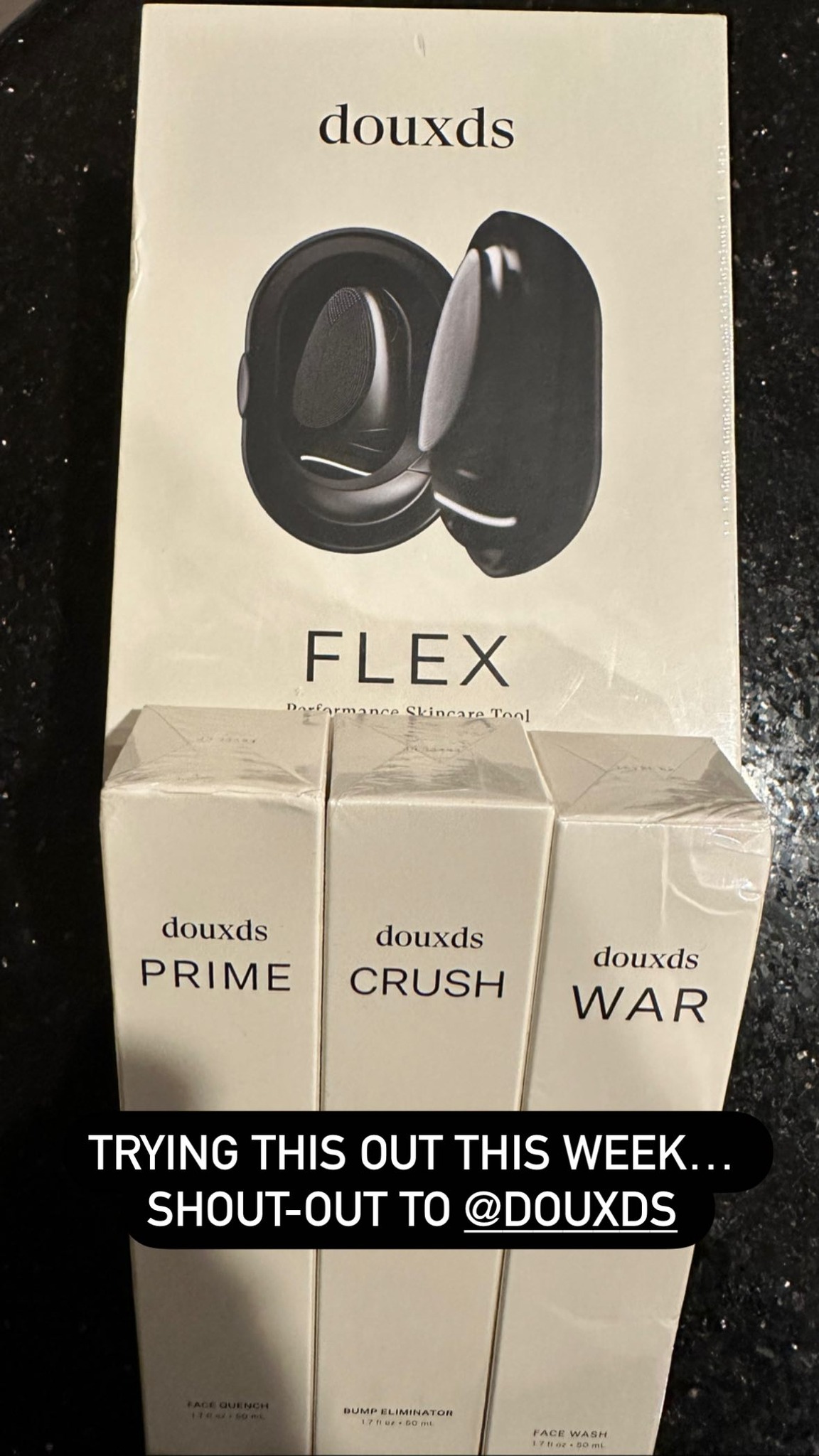 FLEX Face Brush Improves Skincare Product Absorption for Men Man holding skincare serums after using the FLEX Face Brush for improved product absorption
