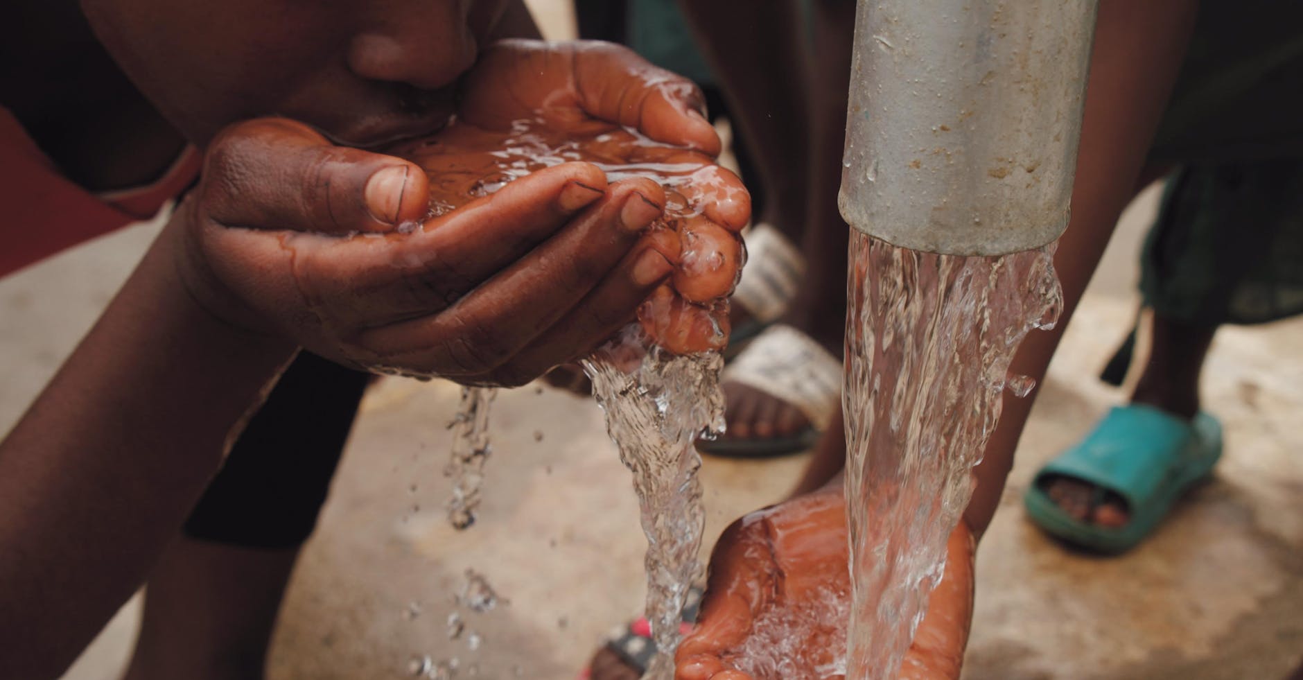 Running tap water representing fluoride sources in daily life