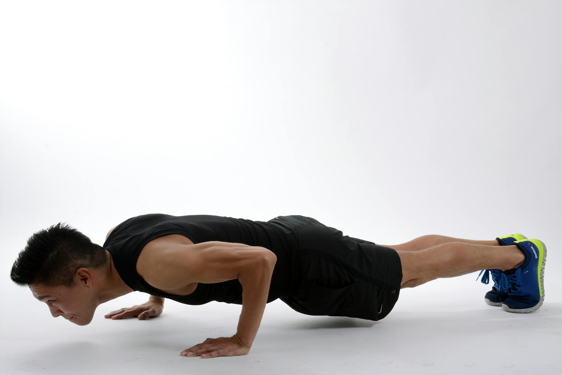 Athlete demonstrating strength and conditioning exercises — the foundation of improved golf performance