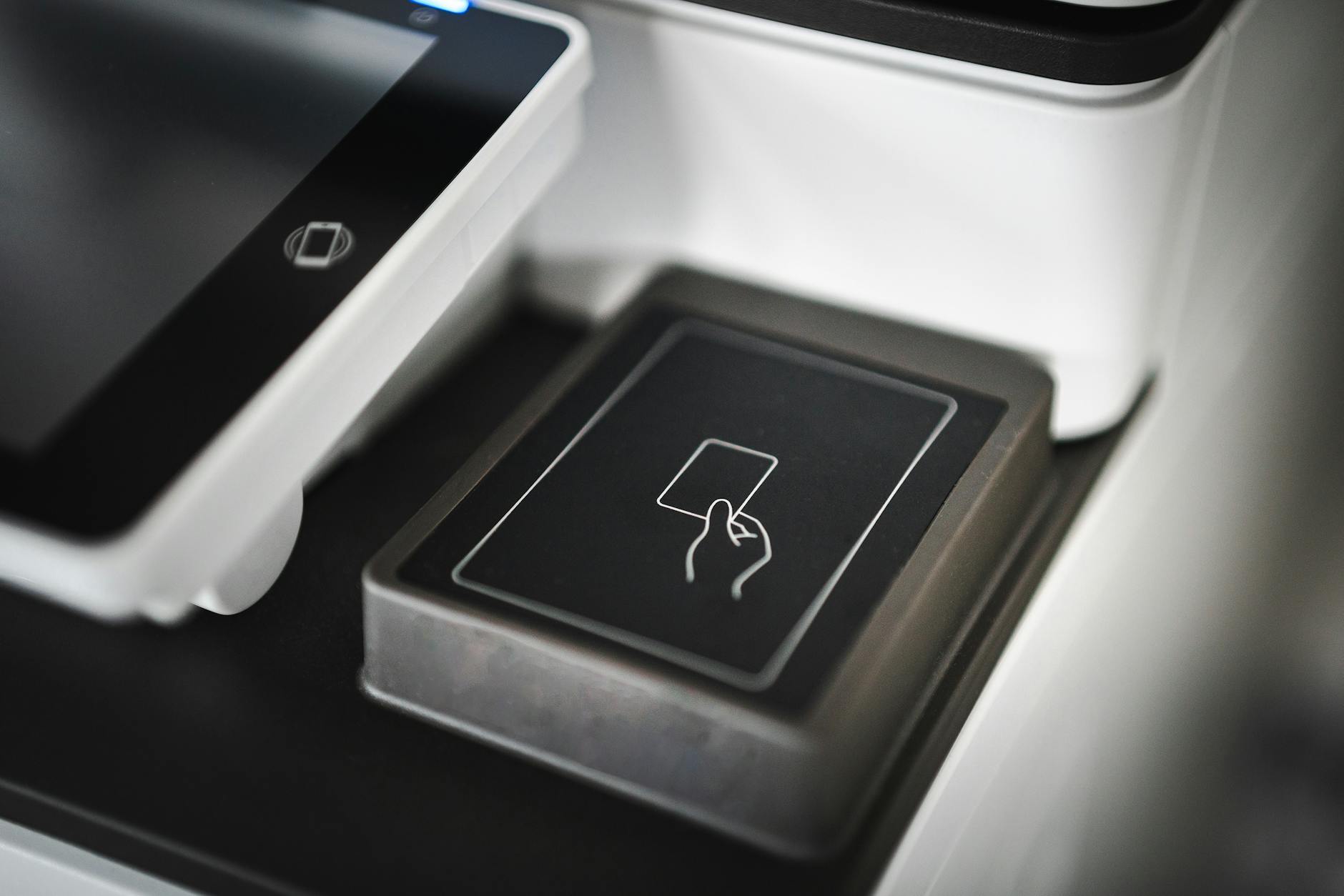 Modern contactless payment terminal used for NFC tap-to-pay transactions