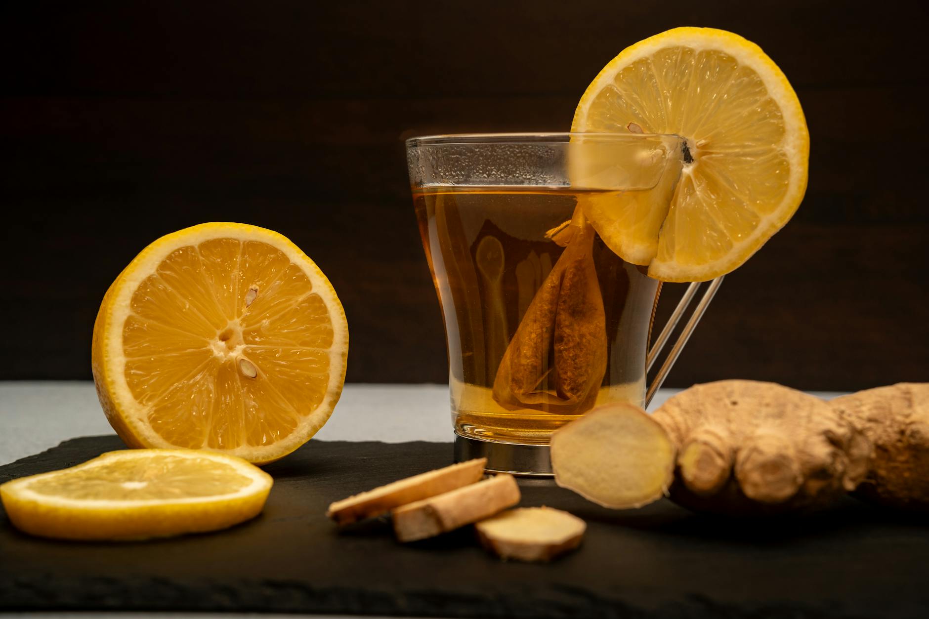 Lemon Ginger Tea Liver Wellness Ritual 2026 Warm lemon ginger tea with fresh ginger root — a calming evening drink to support liver function and sleep