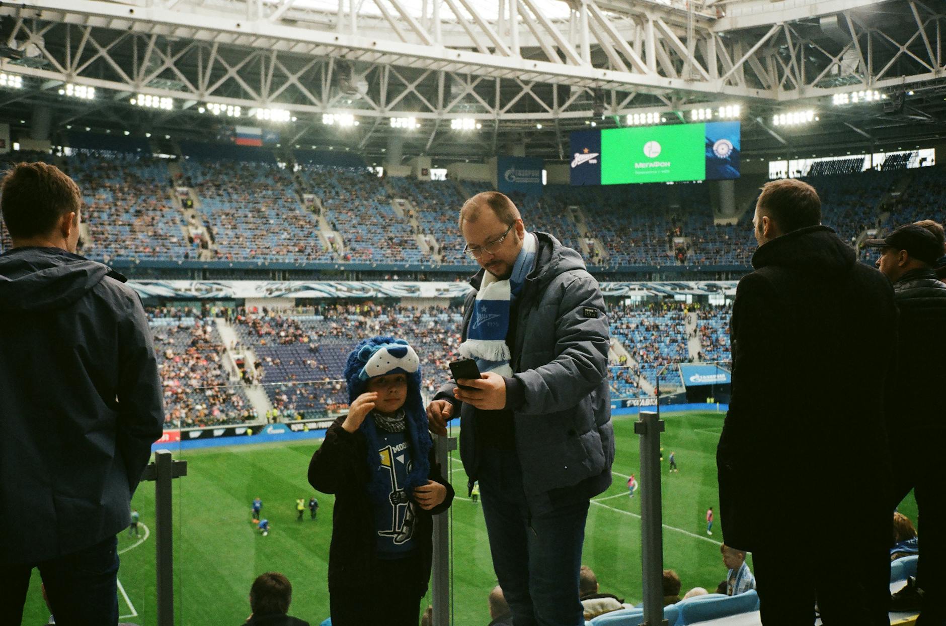 European Football Travel Tips - Fan Atmosphere at Champions League Enthusiastic football fans enjoying a match at a European stadium