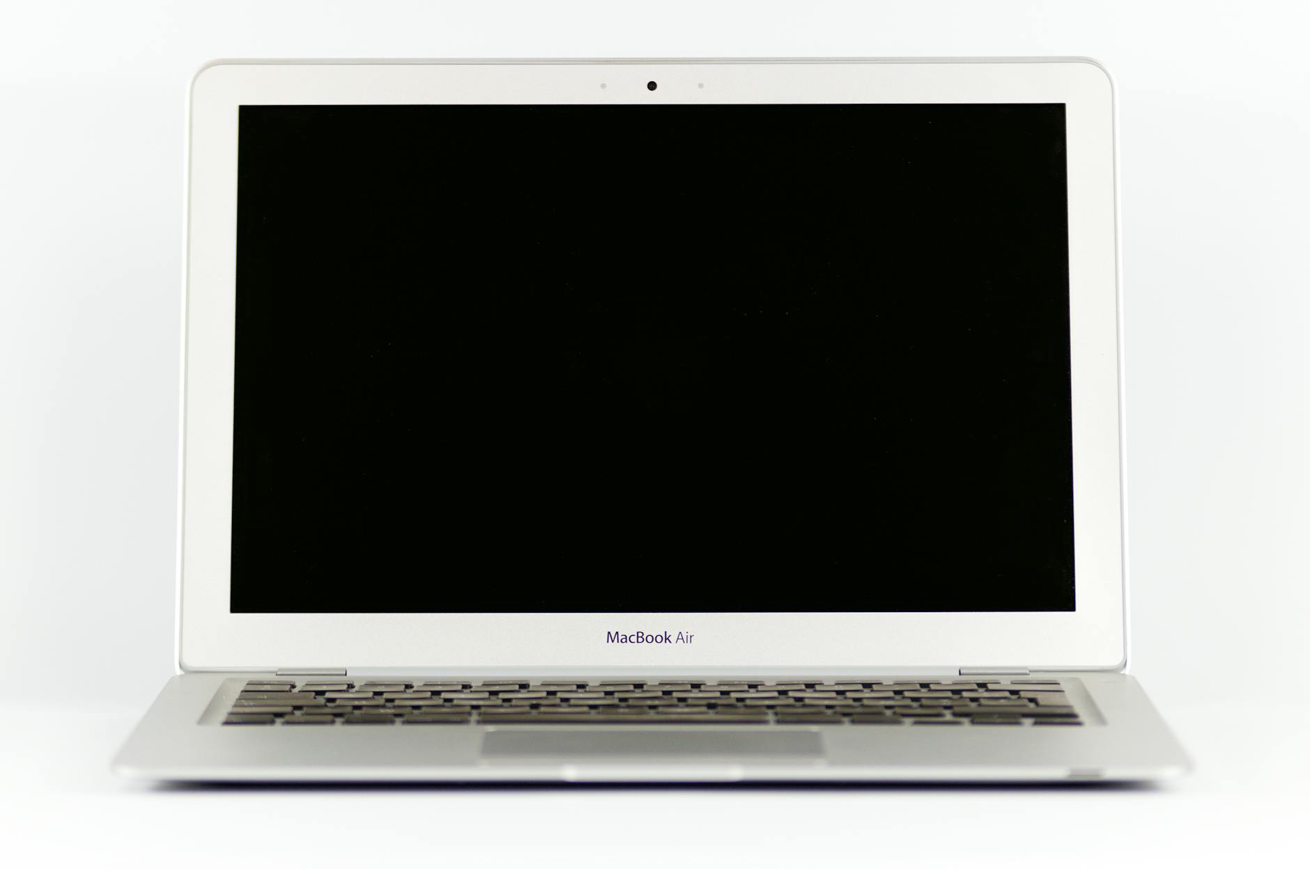 Streaming NBA Games on Laptop Laptop displaying streaming content on blank screen