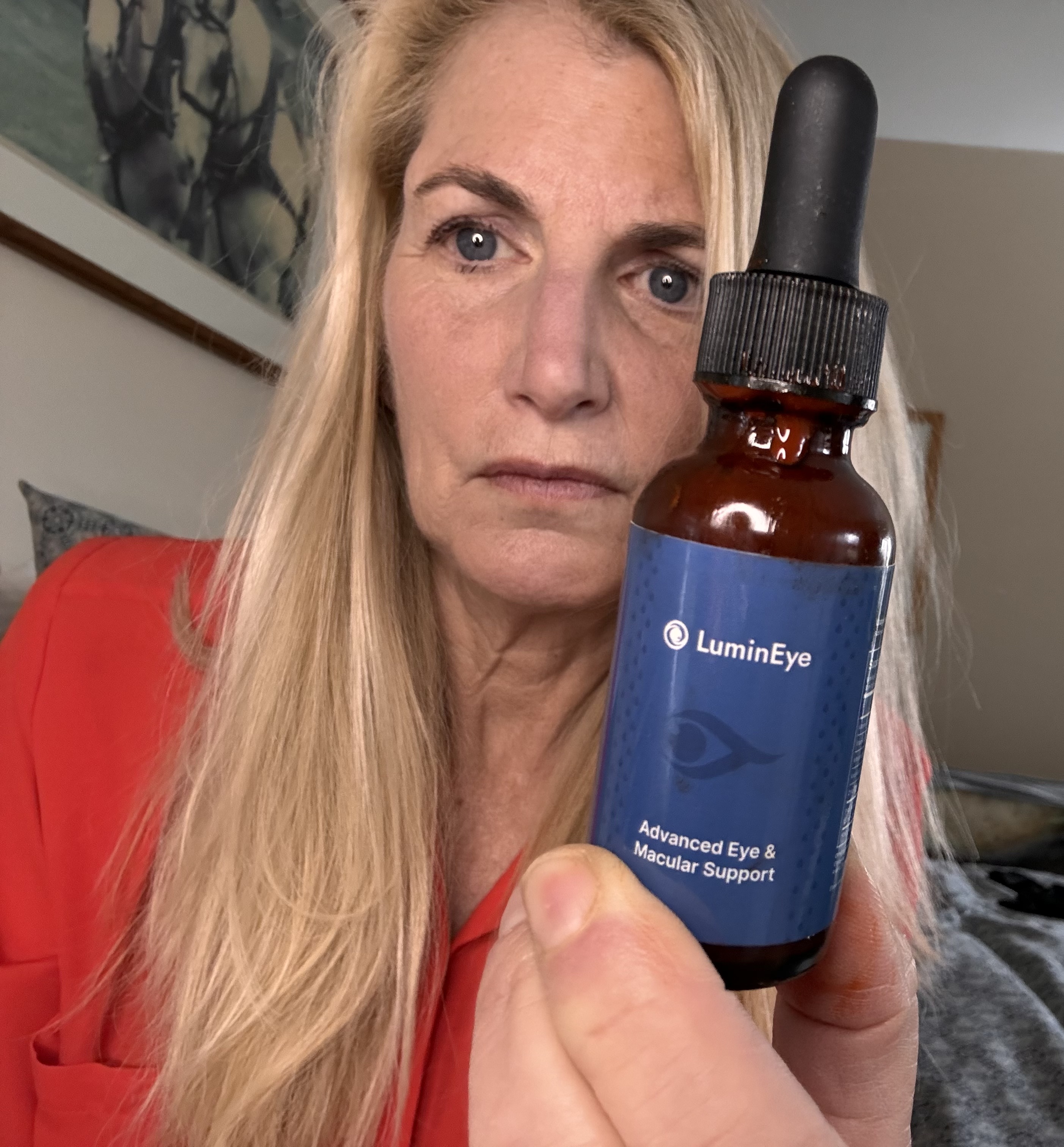 LuminEye Nano-Drop Blue Dropper Bottle 2026 Close-up of LuminEye Nano-Drop blue dropper bottle held in hand