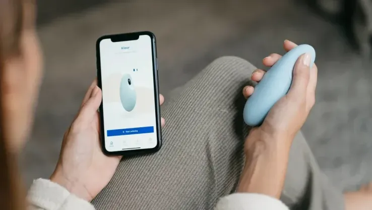 Moonbird compared to phone app breathing exercises, showing the screen-free advantage of the haptic device