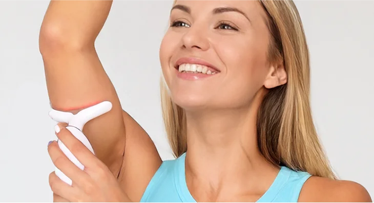 MyoGlow arm sculpting device being used on upper arm skin