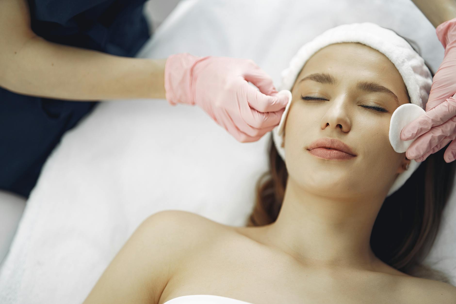 RF Microneedling and Skin Tightening Spa Treatment Woman receiving a professional facial skin treatment in a spa clinic environment