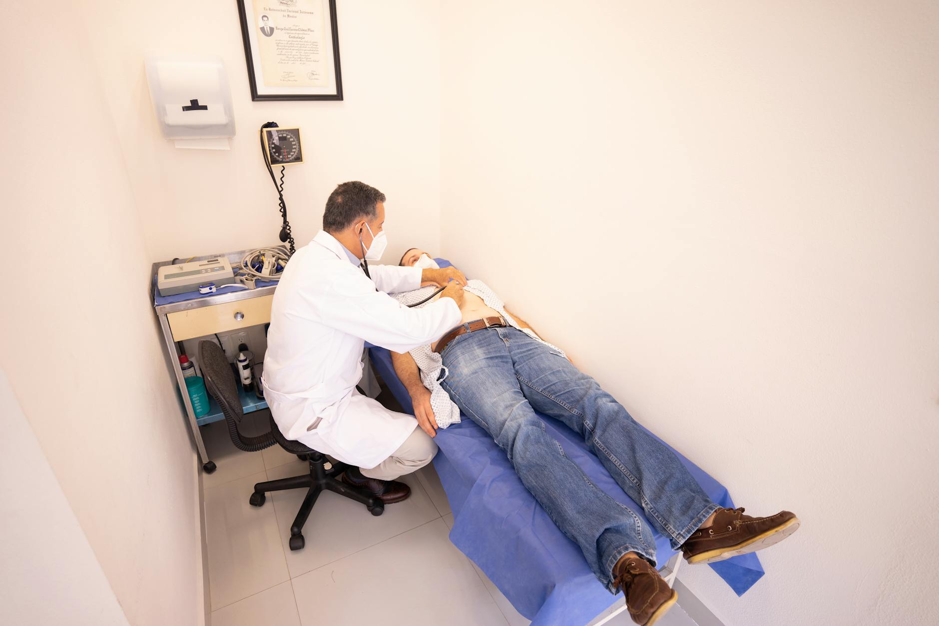 Medical Examination for Peripheral Neuropathy Diagnosis A medical professional conducting a thorough patient examination to diagnose peripheral neuropathy