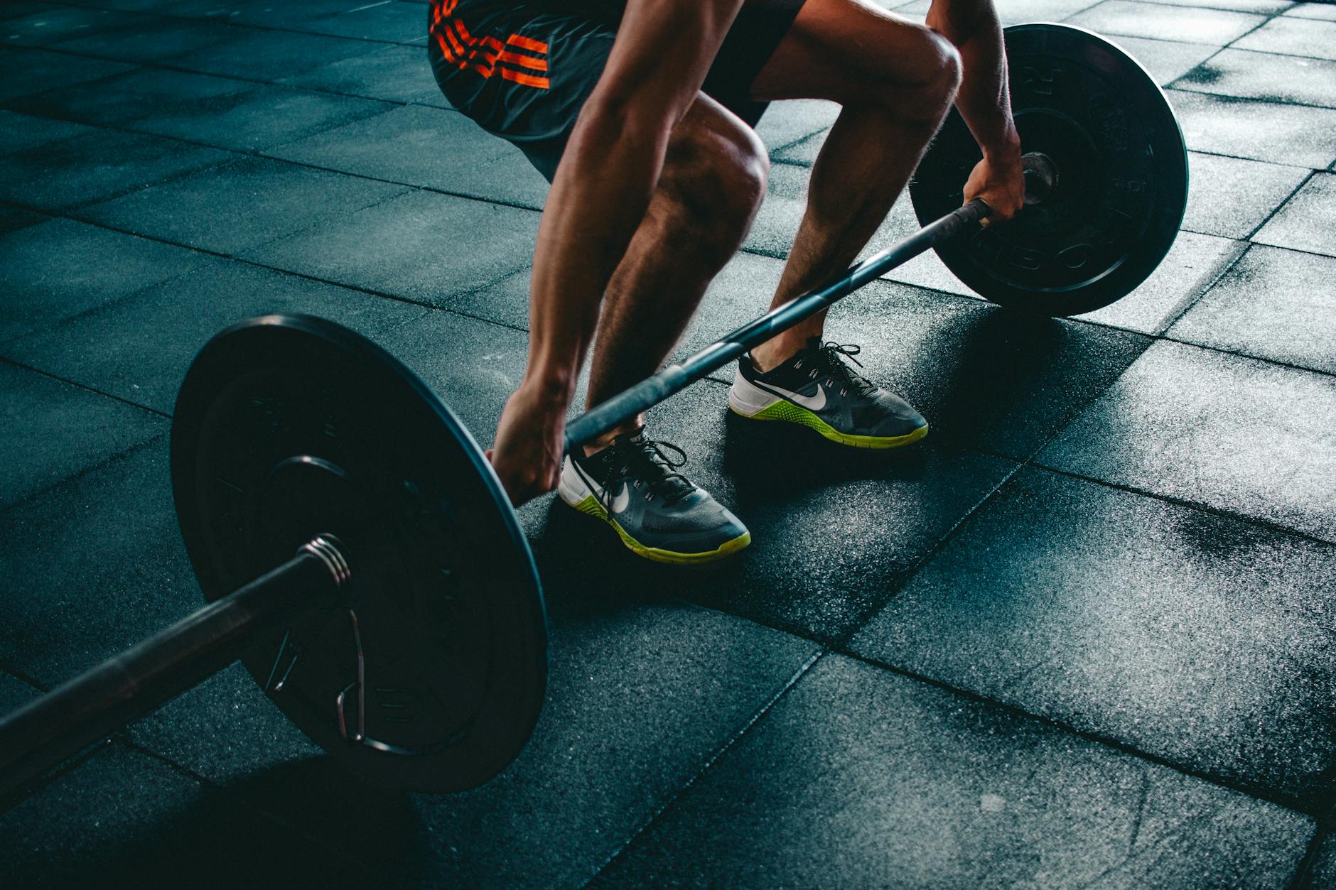 Strength Training at the Gym 2026 Man performing strength training exercises at a gym