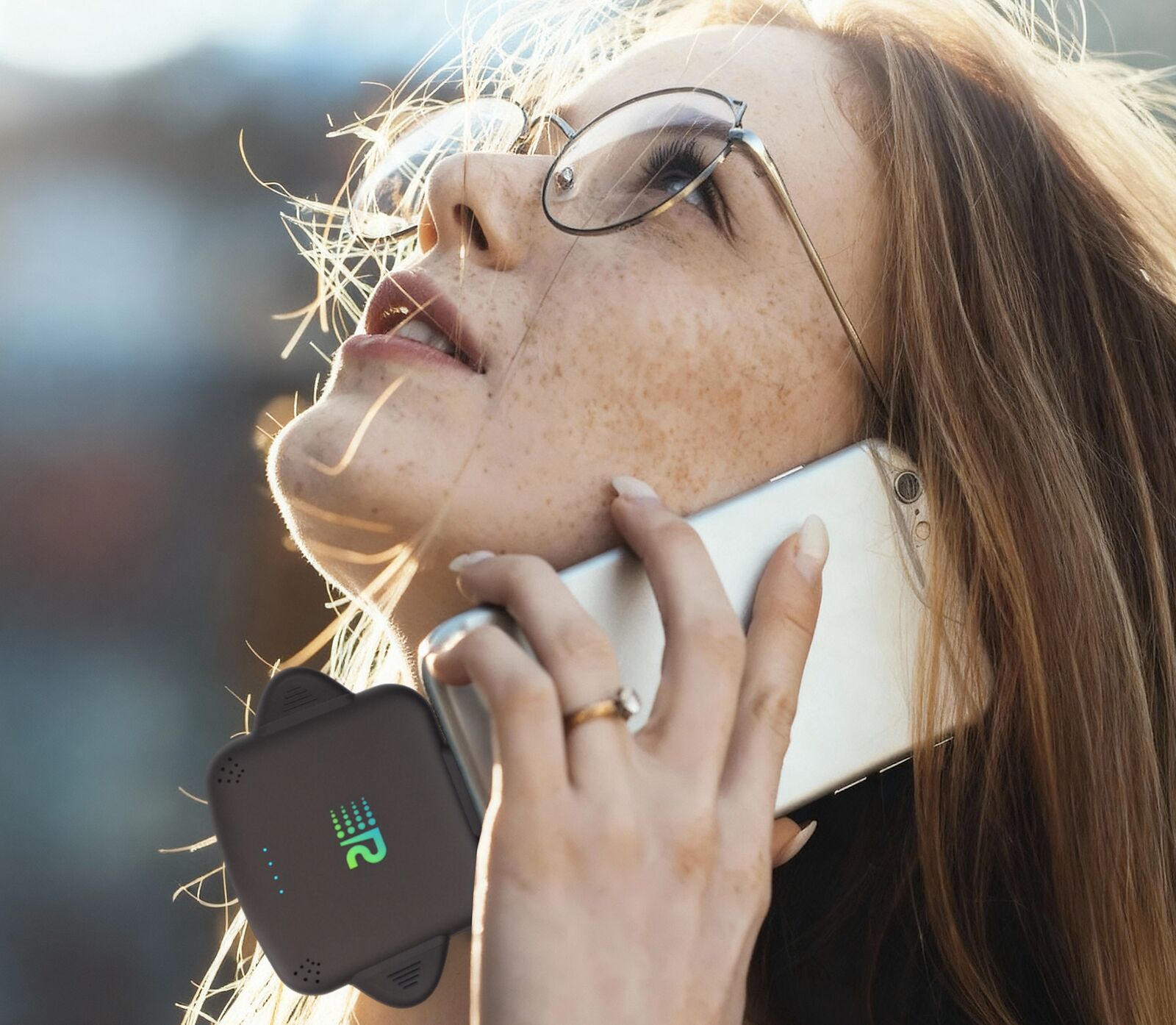 Rush Charge portable charger in use while traveling — compact and wire-free