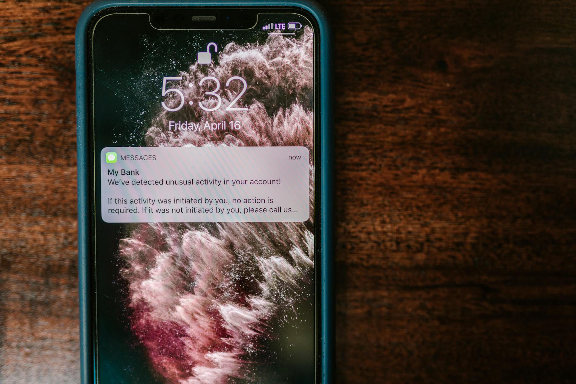 Smartphone displaying a security alert notification — a common sign of malware on phone