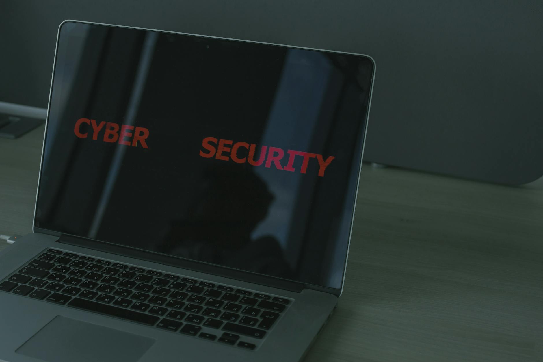 Cybersecurity Warnings on Laptop Screen 2026 Laptop screen displaying cybersecurity alerts and data protection warnings