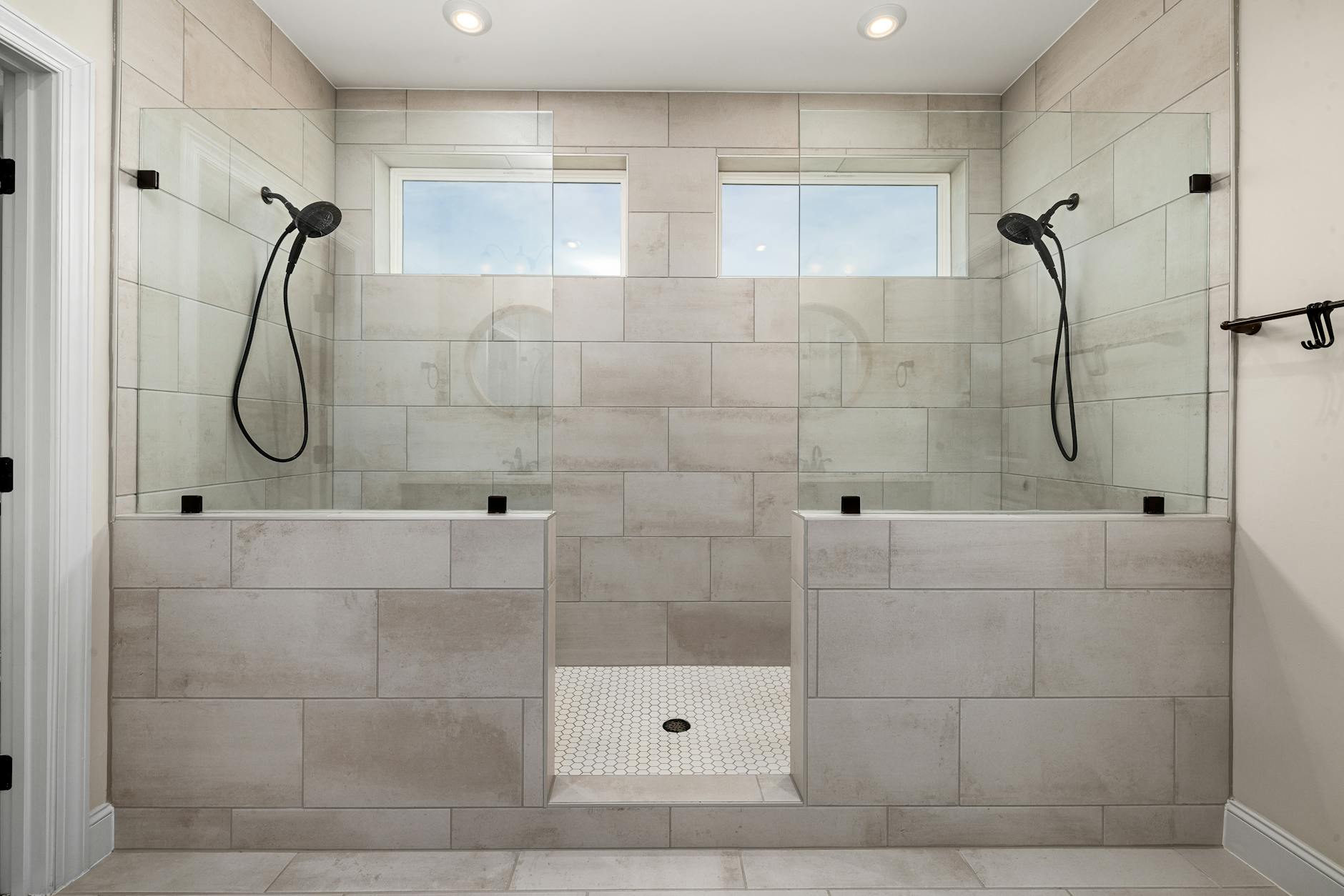 Synoshi Pro Power Scrubber Review 2026 — Clean Tile Results Modern dual shower bathroom with clean tile work — the kind of results a power scrubber for tiles like the Synoshi Pro helps maintain