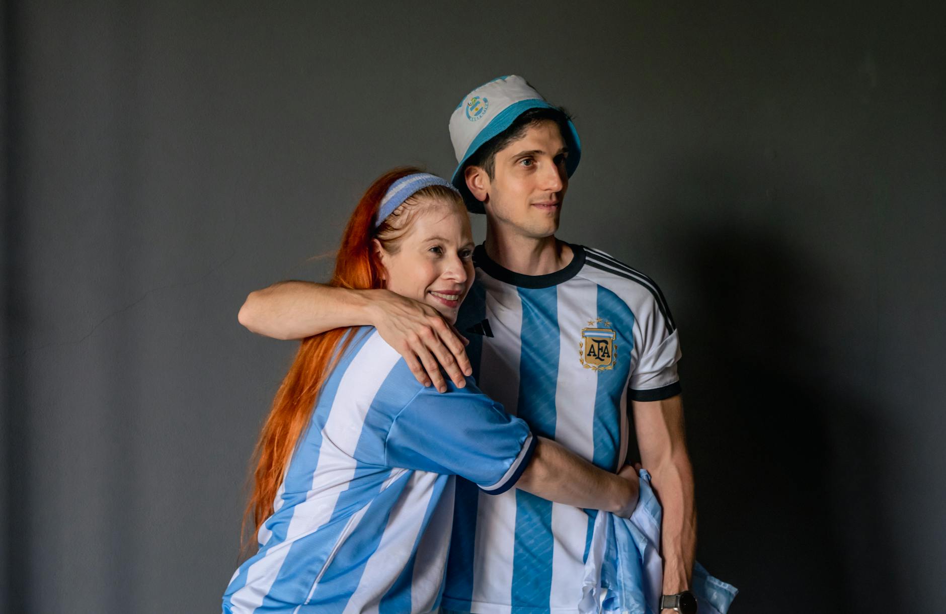 Argentina Soccer Fan Culture 2026 Fans in Argentina jerseys celebrating a soccer match result
