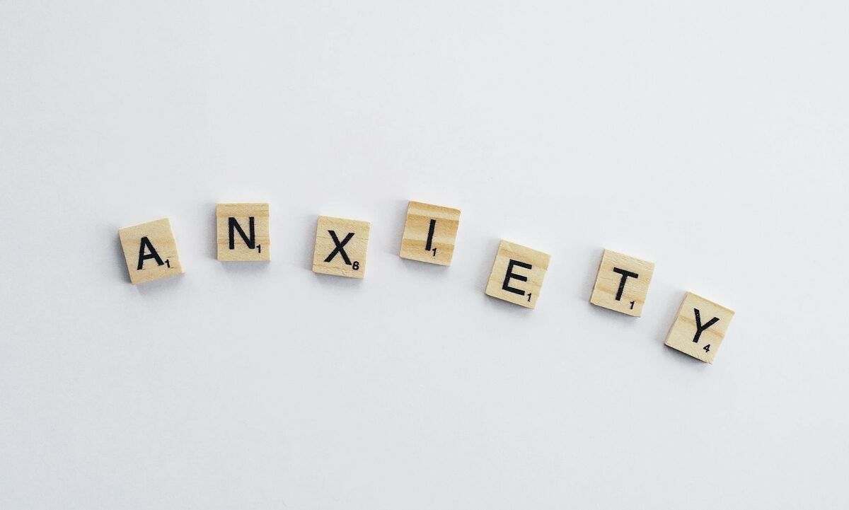 Wooden tiles spelling anxiety representing the mental health connection to vagus nerve function