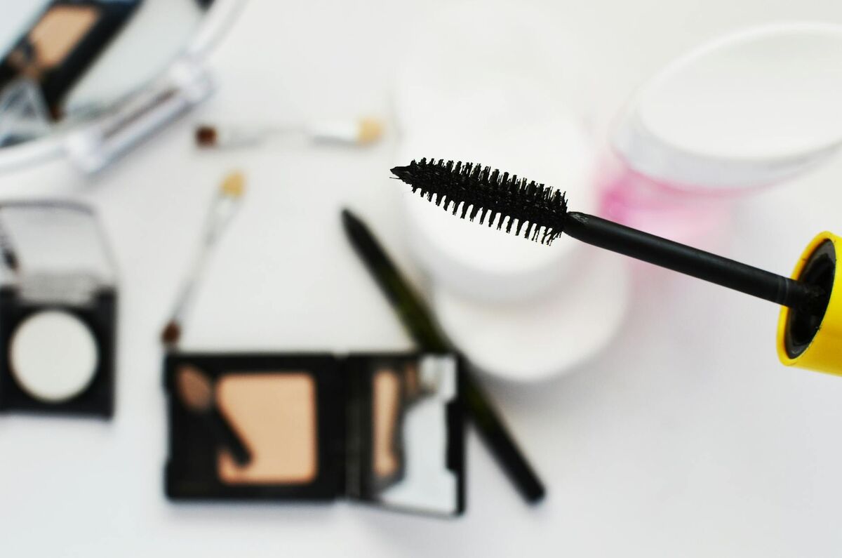 Flat lay of beauty and cosmetic products for a makeup routine