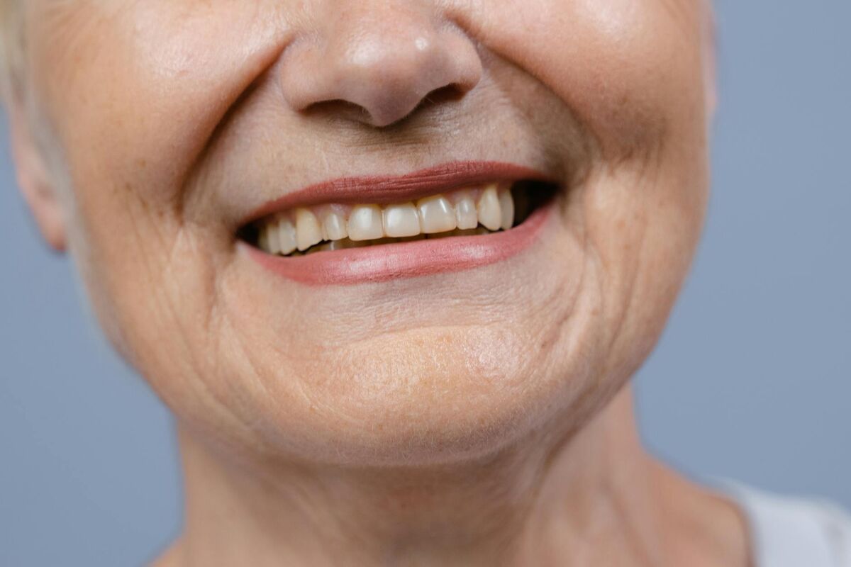 The Real Reason Teeth Go Yellow With Age (It's Not What You Think)