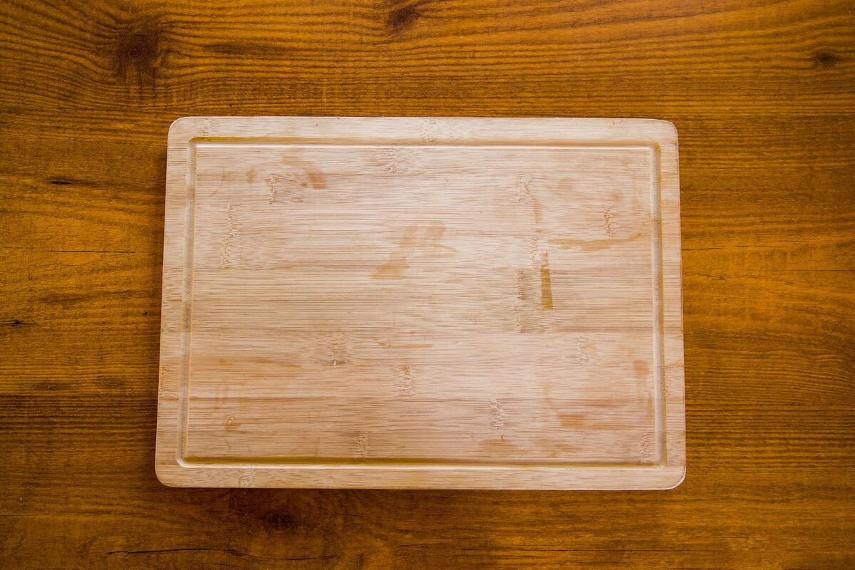 Natural wooden bamboo chopping board seen from above